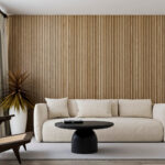 Living room wood accent wall with fluted wood panels